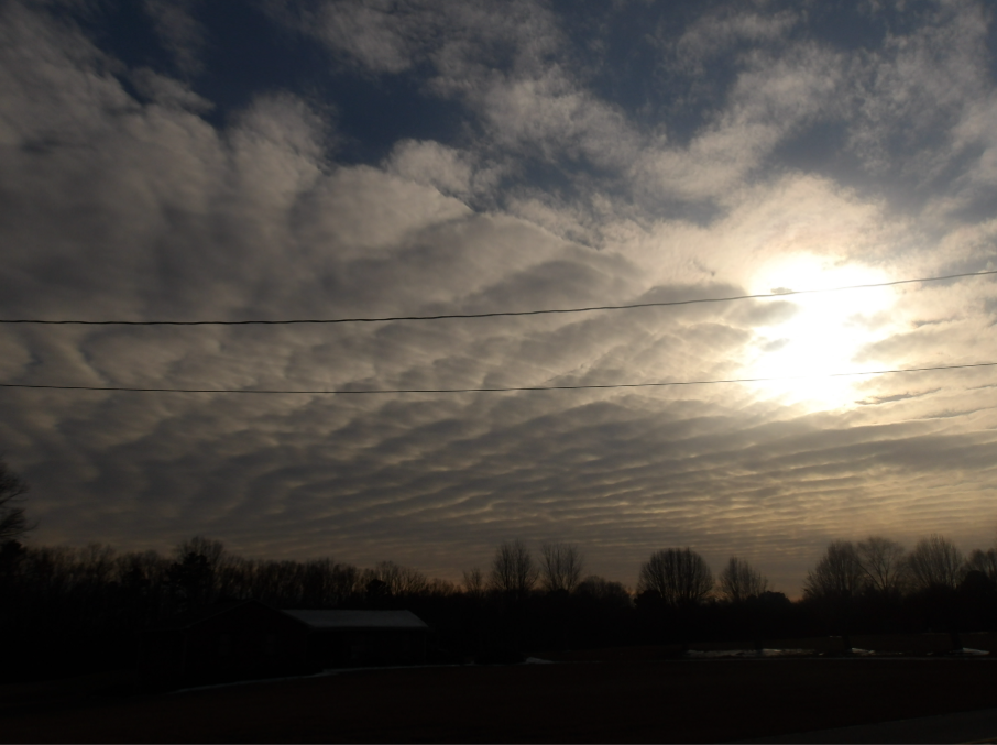 Altocumulus undulatus clouds.png