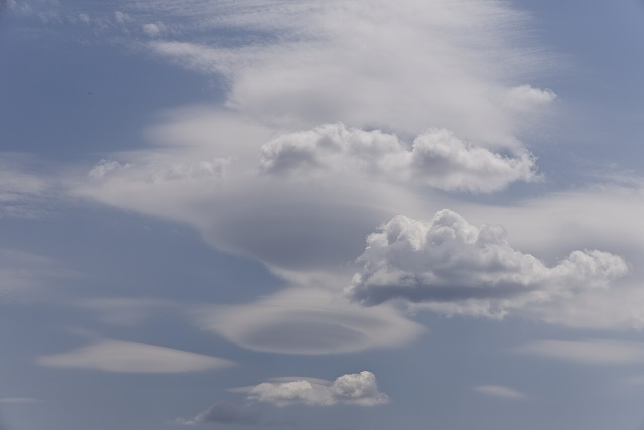 Lenticular clouds and cumulus over flat New Braunfels.jpg
