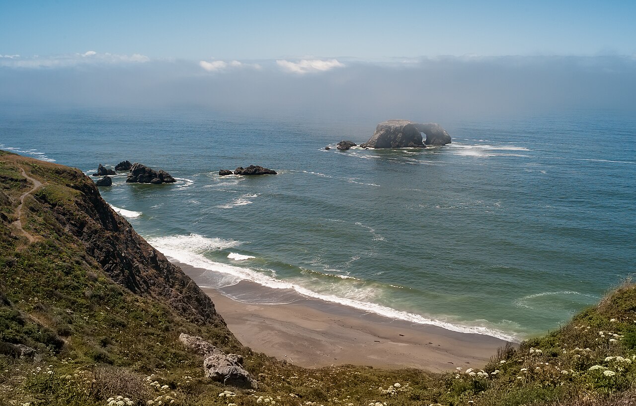 Fog rolling over Arched Rock.jpg